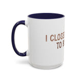 I Closed My Book To Be Here Accent Coffee Mug (11, 15oz)